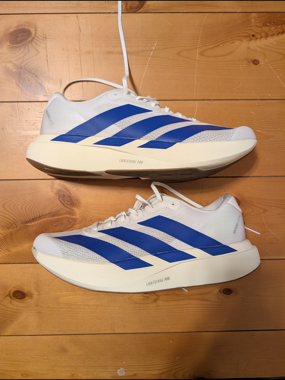 Adidas Men’s White & Blue Running Shoes — Lightweight Performance